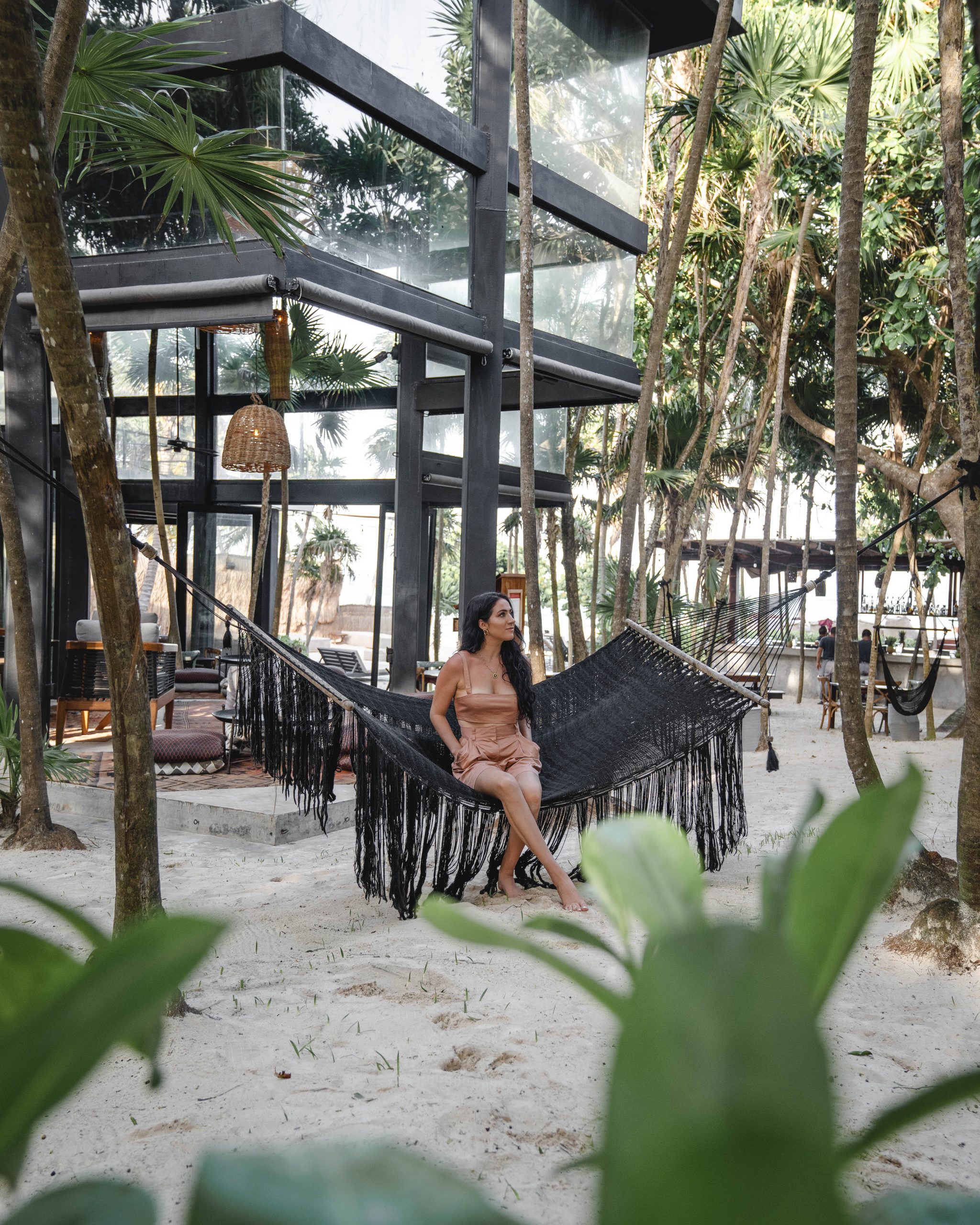 Christina at Habitas Tulum outdoor area | where to stay in Tulum