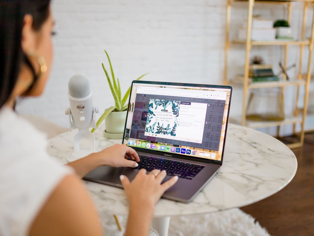 planning content on laptop Christina on laptop planning grid | What’s Trending on Social Media in 2021
